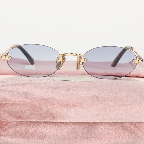 Women Fashion Rimless Oval Sunglasses Brand Desinger Retro Popular Eyeware Girls Travel Party Shades Frameless Sun Glasses UV400
